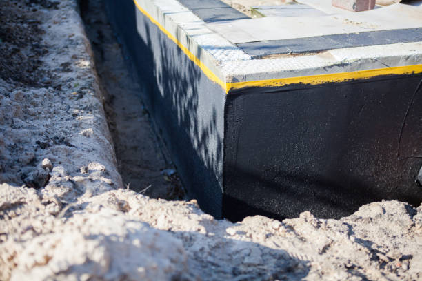 Professional Basement Waterproofing technician working in Clarkston, GA